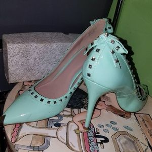 Mint green heels with studs around rim
